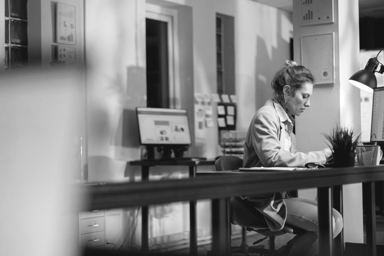 Close-up of designer sketching interface wireframes and user flow diagrams